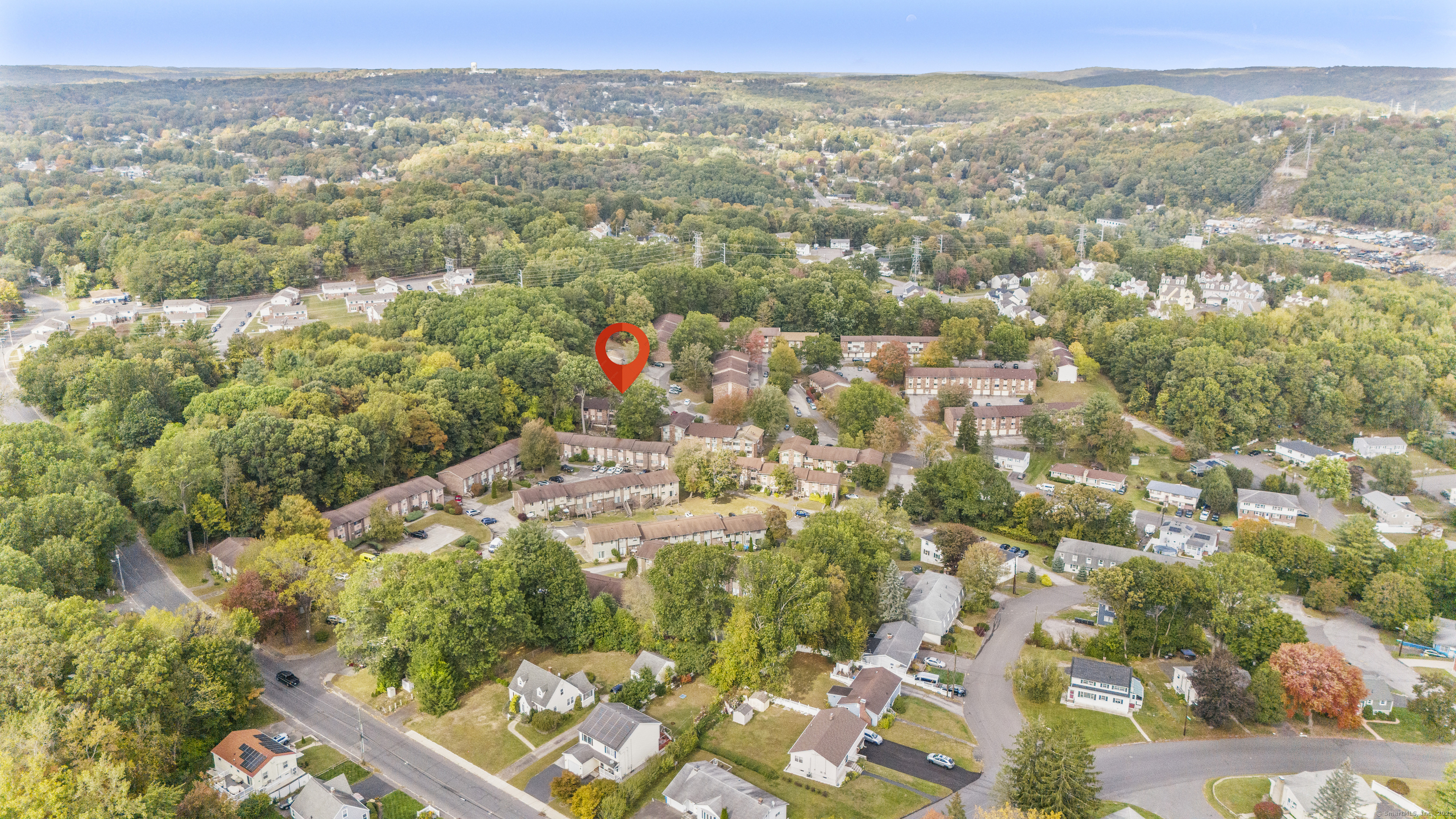 203 Kaynor Drive, Unit B Waterbury, CT 06708 - Photo 2 of 36 an aerial view of residential house with yard and mountain view in back