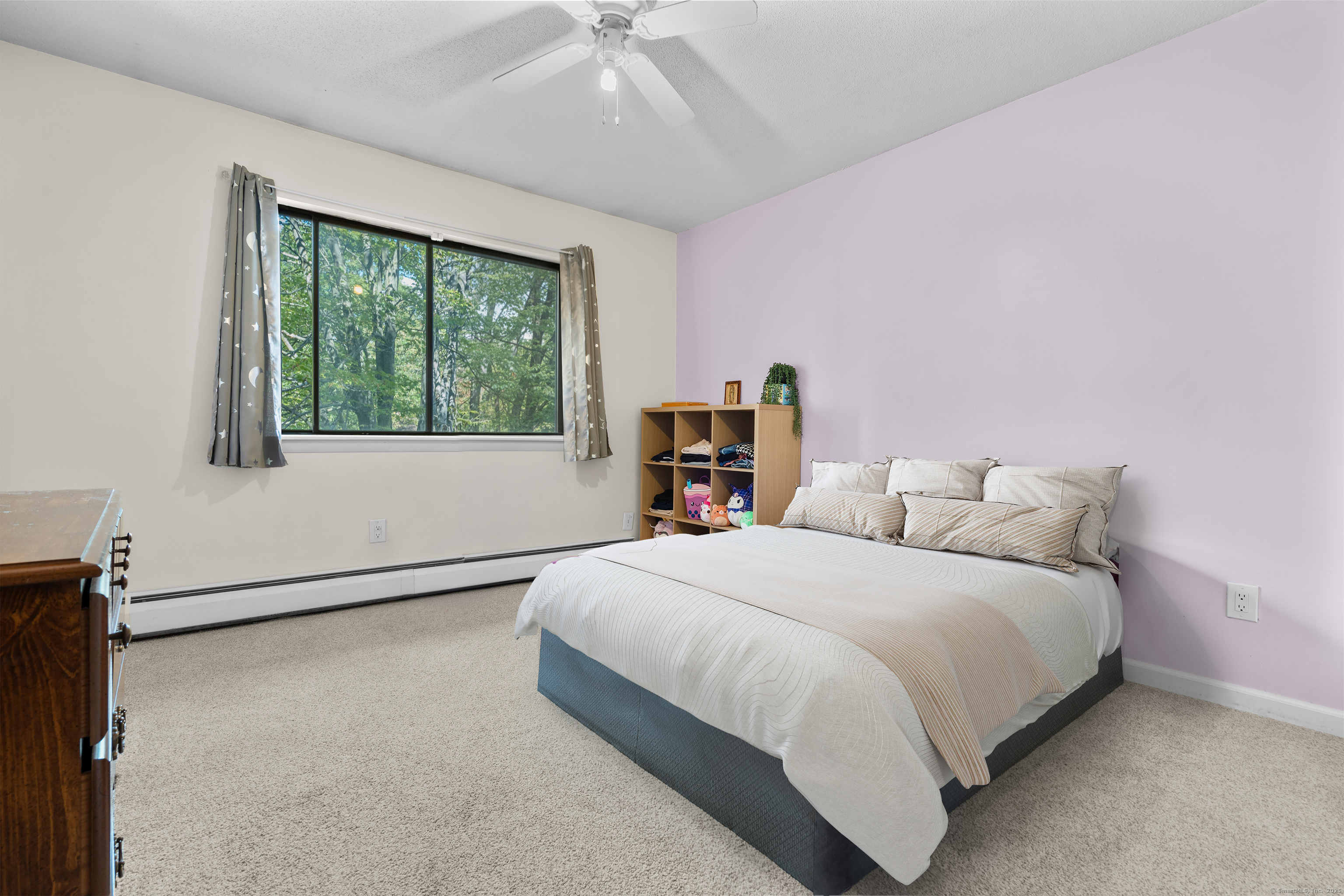 203 Kaynor Drive, Unit B Waterbury, CT 06708 - Photo 24 of 36 a bedroom with a large bed and a large window