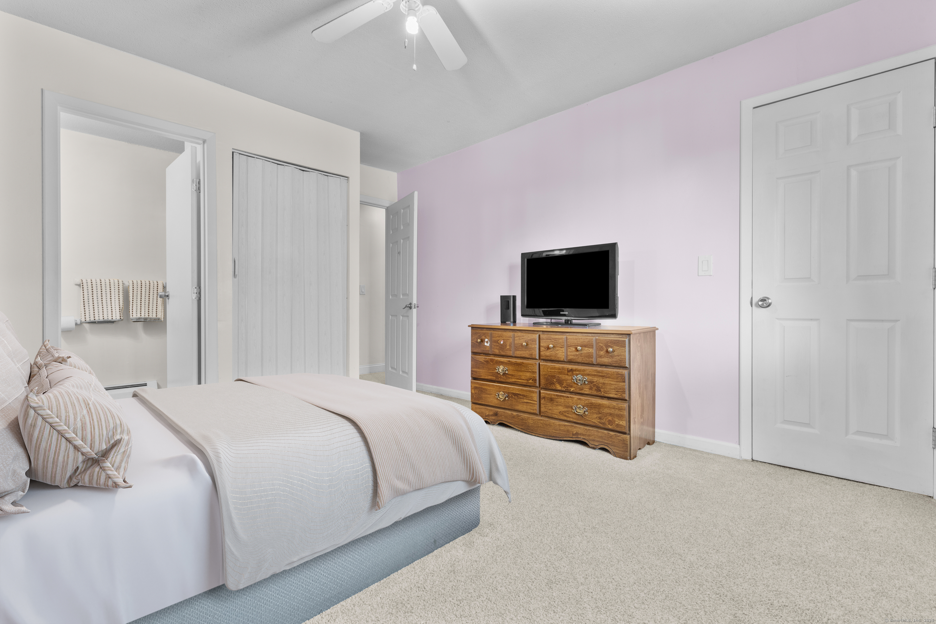 203 Kaynor Drive, Unit B Waterbury, CT 06708 - Photo 25 of 36 a bedroom with a bed and flat screen tv