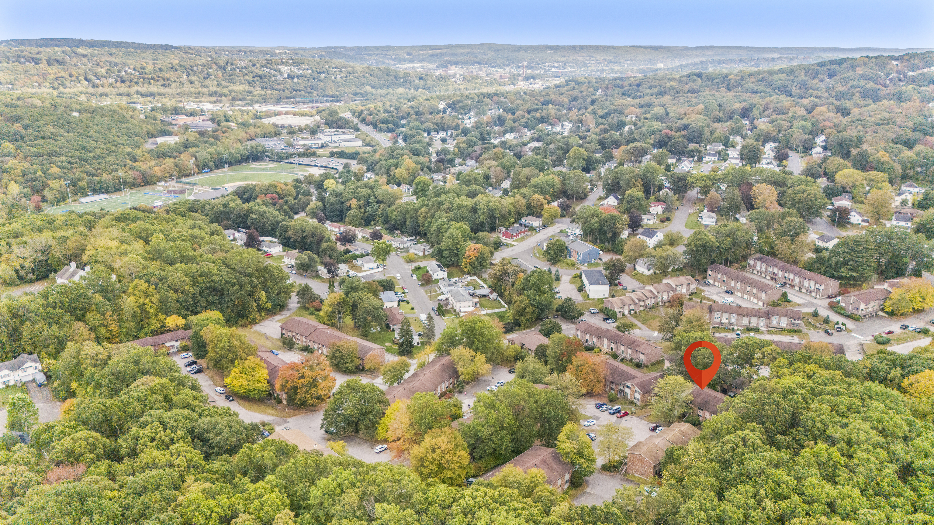 203 Kaynor Drive, Unit B Waterbury, CT 06708 - Photo 34 of 36 an aerial view of residential house with yard and mountain view in back