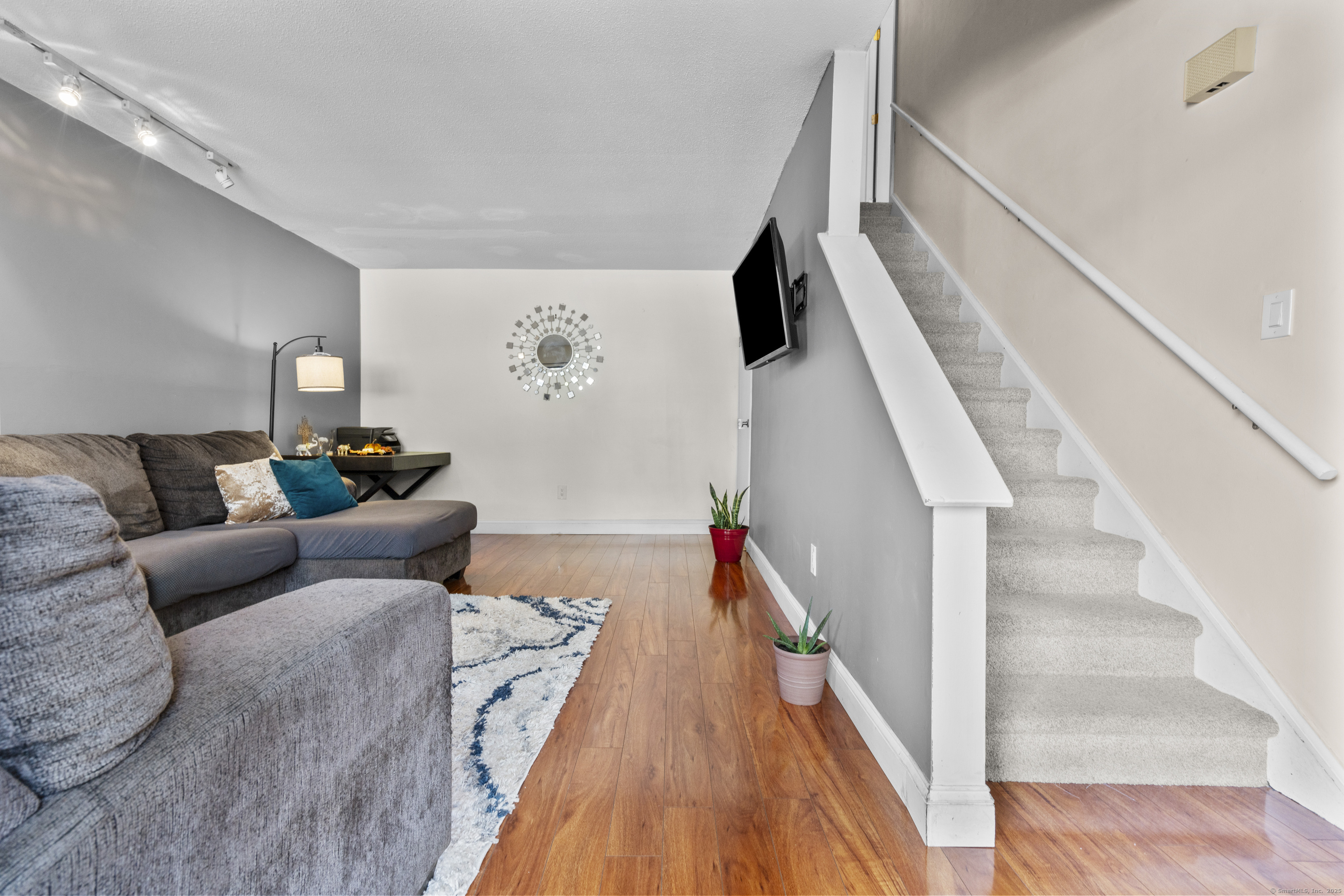 203 Kaynor Drive, Unit B Waterbury, CT 06708 - Photo 4 of 36 a living room with furniture and wooden floor