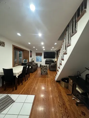 a view of a living room and dining room