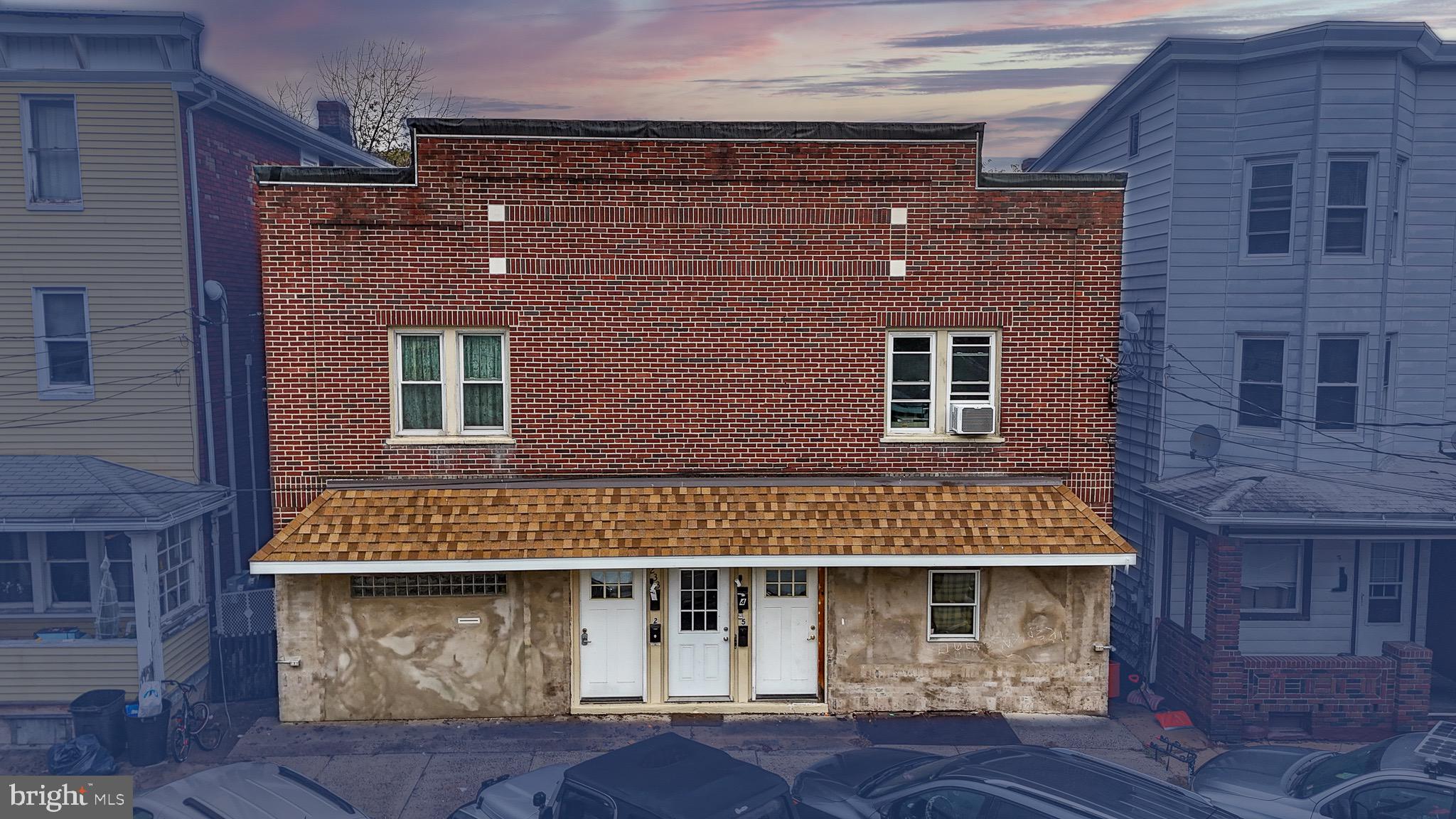 231 East Ridge Street Lansford, PA 18232 - Photo 2 of 7 a front view of a house with plants