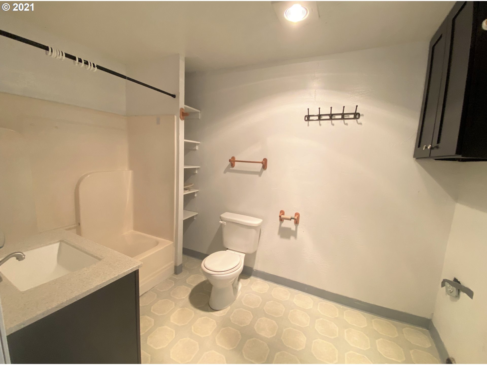 623 Southwest 4th Street Pendleton, OR 97801 - Photo 26 of 32 a bathroom with a sink a toilet and a mirror