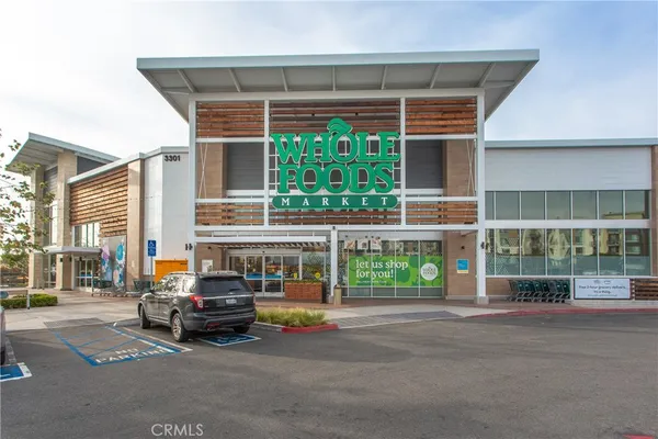 a view of a car park in front of building