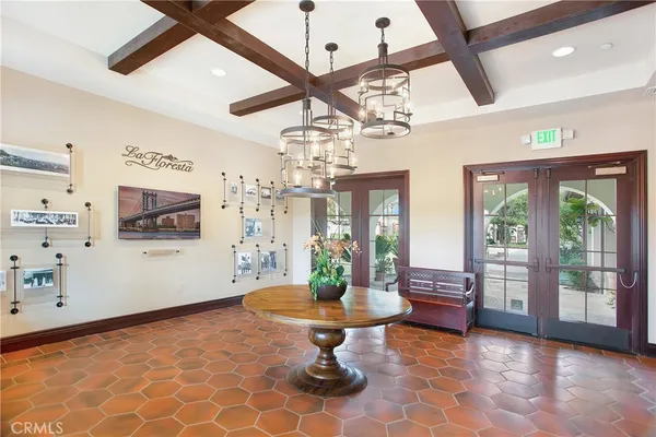 a view of a chairs and table in a patio