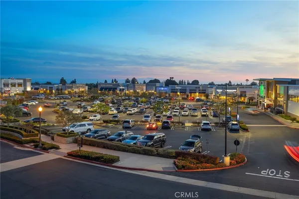 a view of a balcony with furniture