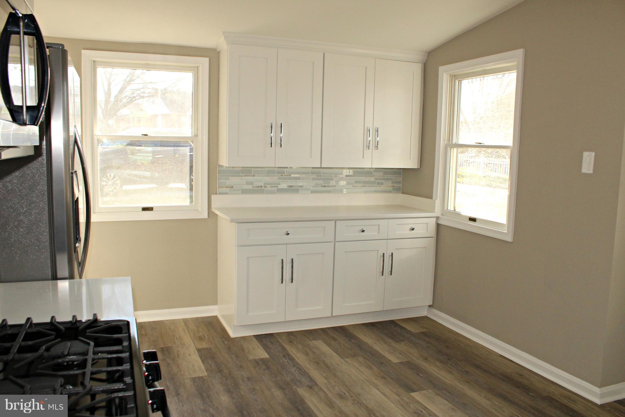 1723 Leslie Road Baltimore, MD 21222 - Photo 5 of 23 New kitchen with quartz counter tops!