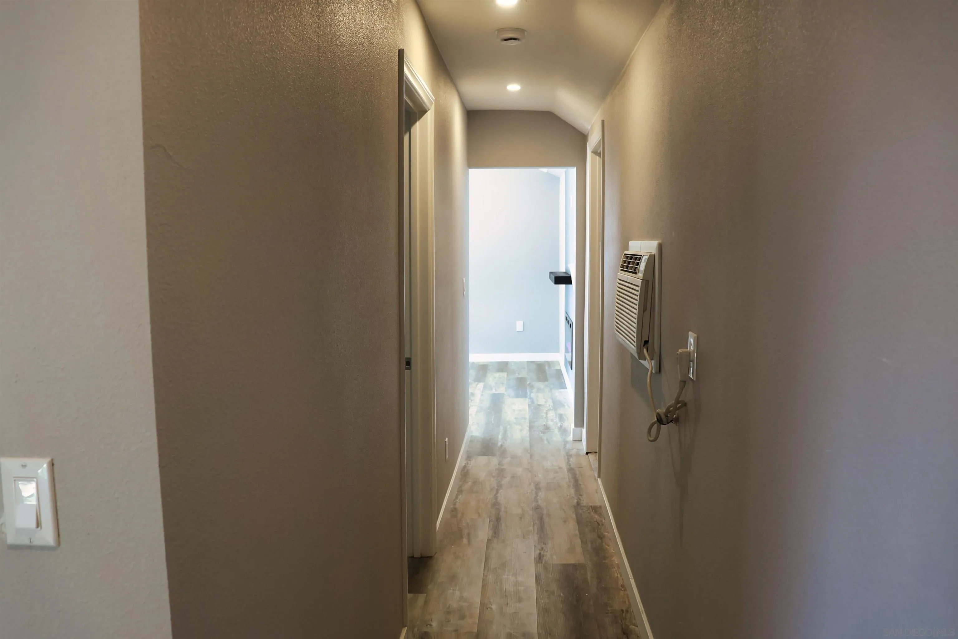 940 South Upas Street Escondido, CA 92025 - Photo 17 of 55 a view of a bathroom from a hallway