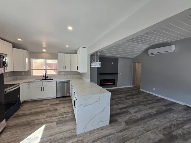 a living room with a fireplace