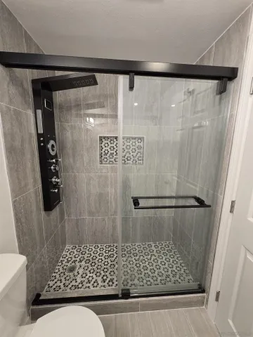 a kitchen with a white cabinets and a stove top oven