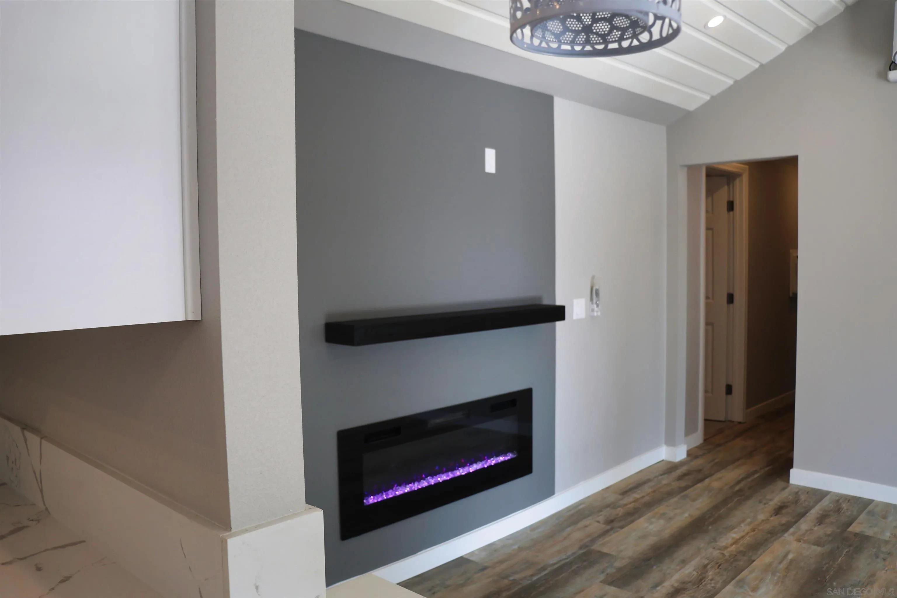 940 South Upas Street Escondido, CA 92025 - Photo 3 of 55 a living room with a fireplace