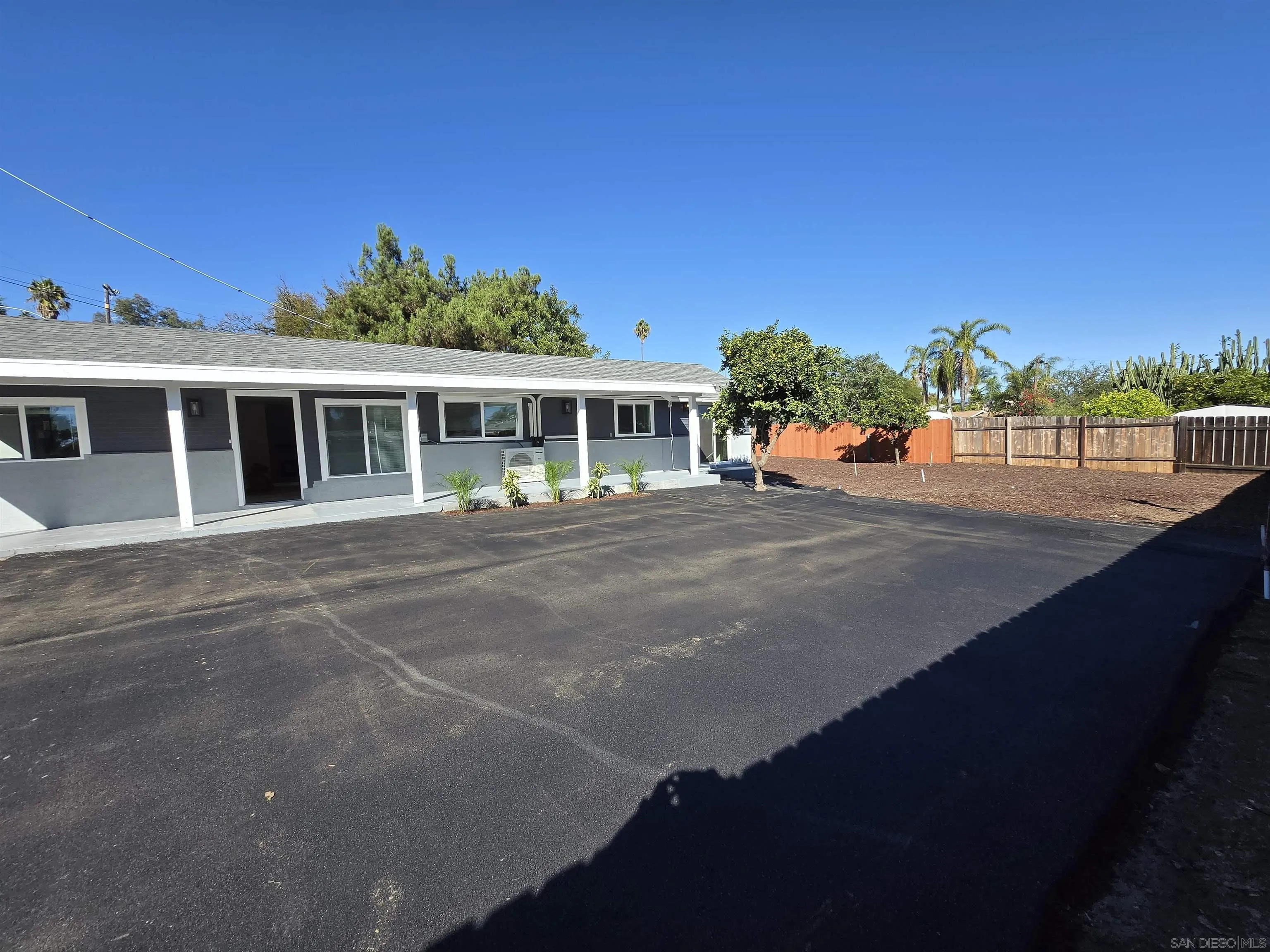 940 South Upas Street Escondido, CA 92025 - Photo 9 of 55 a view of a house with a street