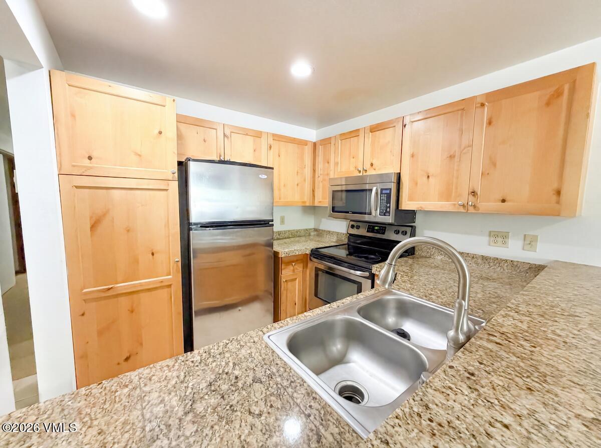 137 Benchmark Road, Unit 216 Avon, CO 81620 - Photo 4 of 12 kitchen 1