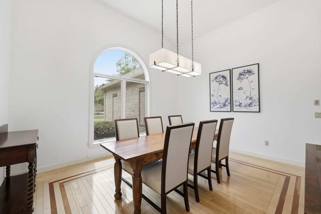 33 Labrie Lane Holyoke, MA 01040 - Photo 6 of 42 a view of a dining room with furniture and wooden floor