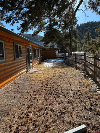 a view of swimming pool from a balcony
