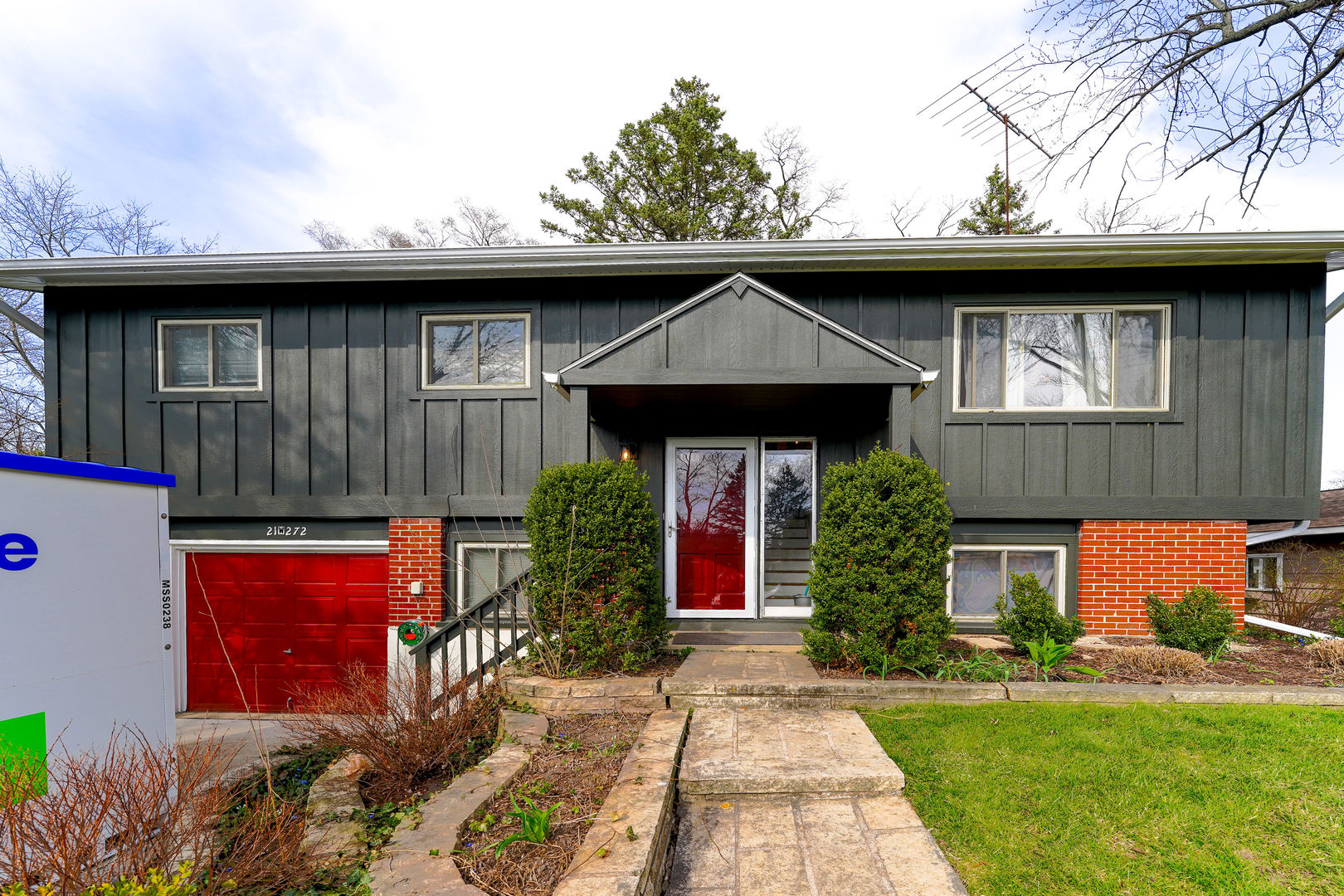 21W272 Coronet Road Lombard, IL 60148 - Photo 1 of 31 a front view of a house with garden