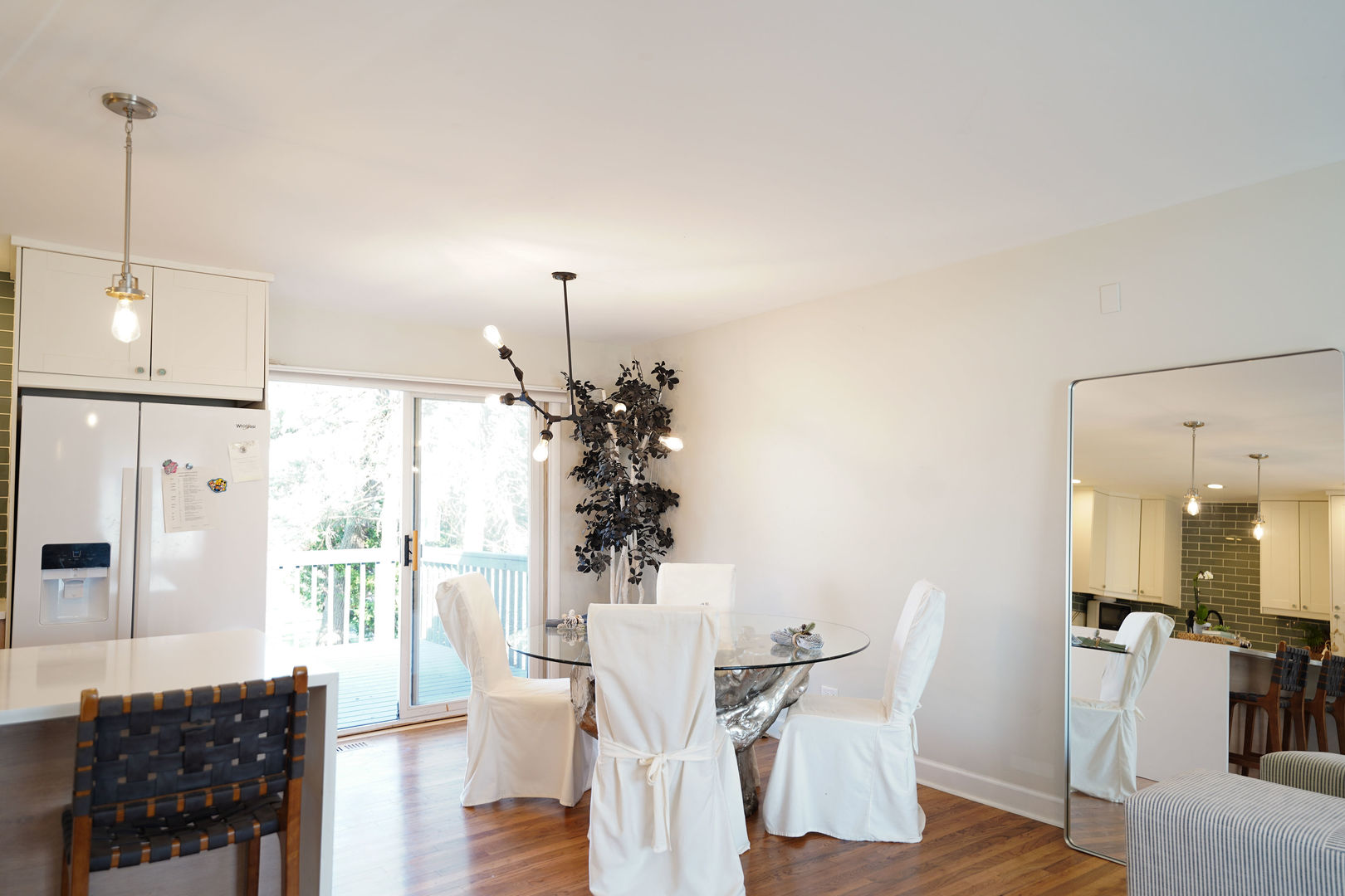 21W272 Coronet Road Lombard, IL 60148 - Photo 27 of 31 a view of a dining room with furniture window and wooden floor