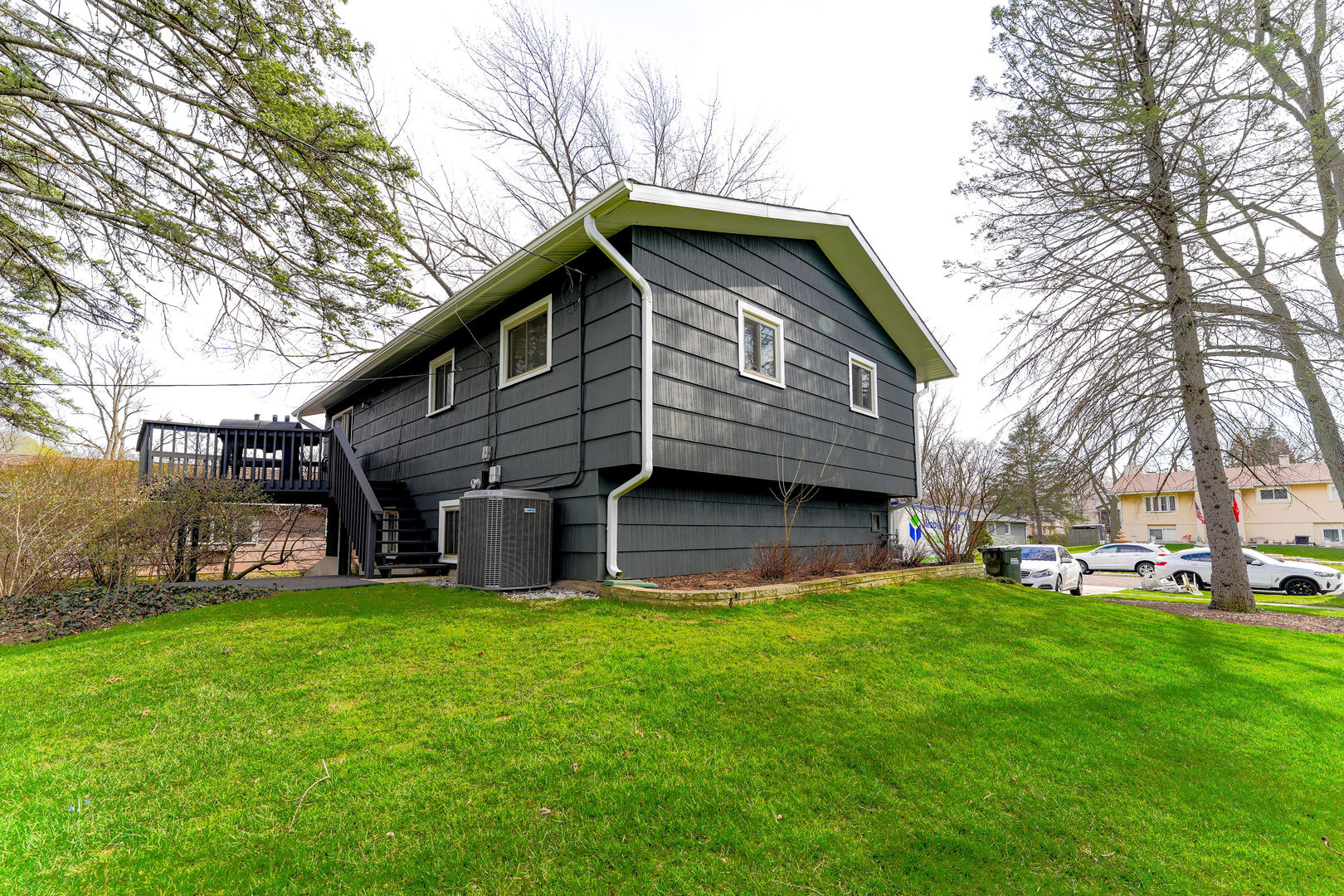 21W272 Coronet Road Lombard, IL 60148 - Photo 5 of 31 a view of a house with a yard porch and sitting area