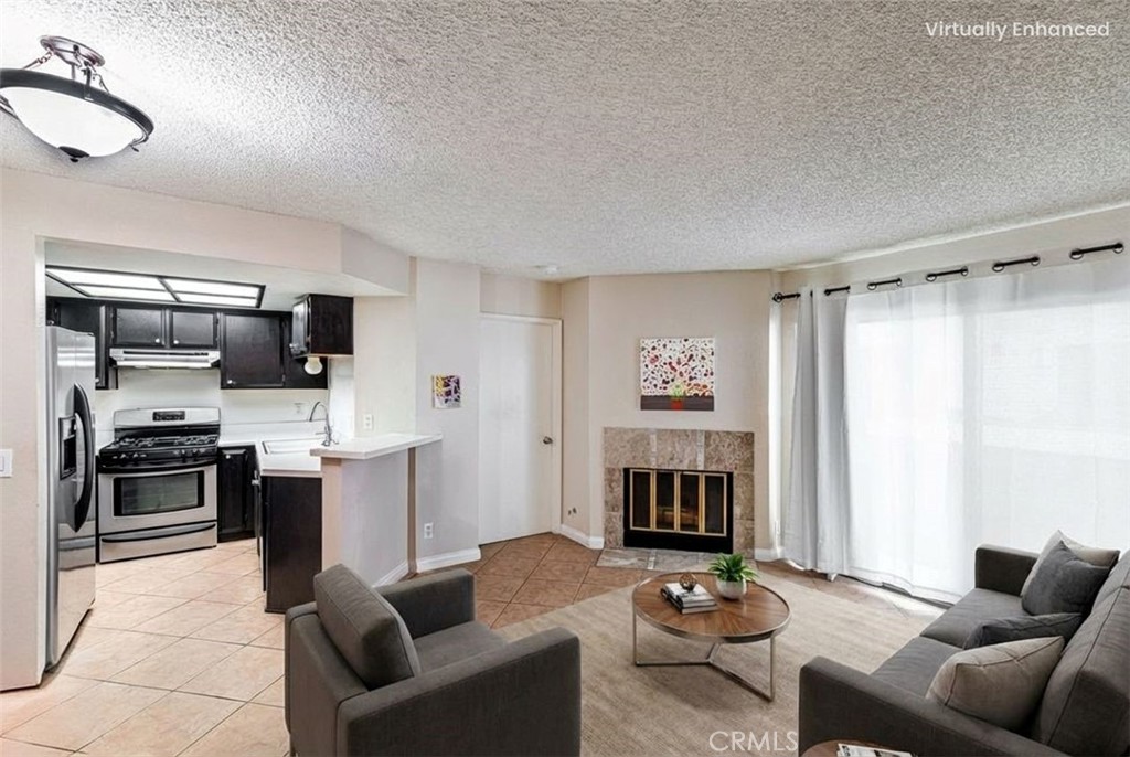 14610 Erwin Street, Unit 212 Van Nuys, CA 91411 - Photo 5 of 12 Virtually staged living room