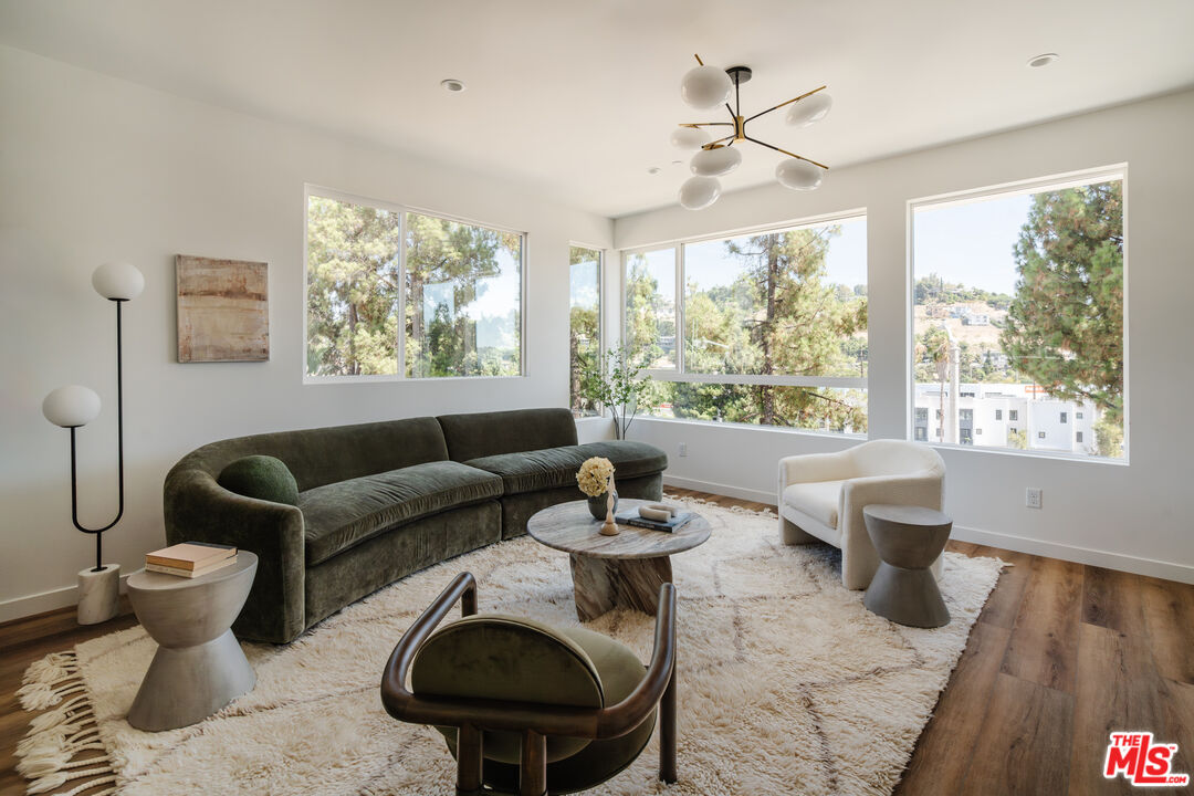 3872 North Riley Lane Los Angeles, CA 90065 - Photo 1 of 30 a living room with furniture and a large window