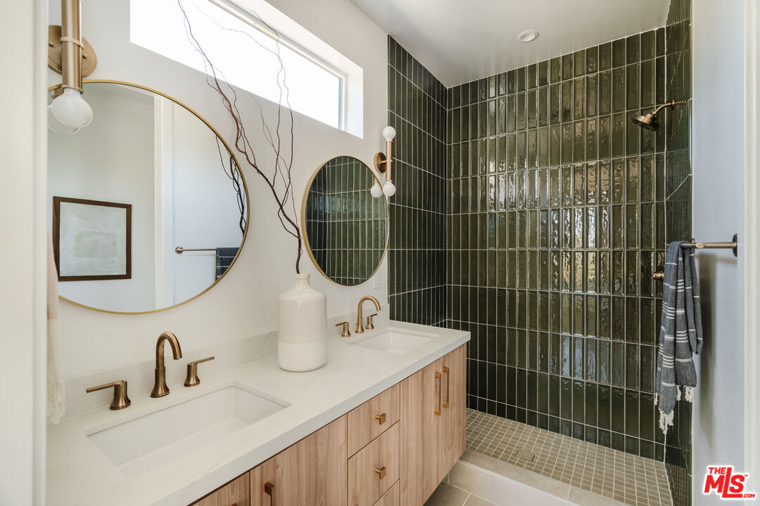 3872 North Riley Lane Los Angeles, CA 90065 - Photo 11 of 30 a bathroom with a sink and a mirror