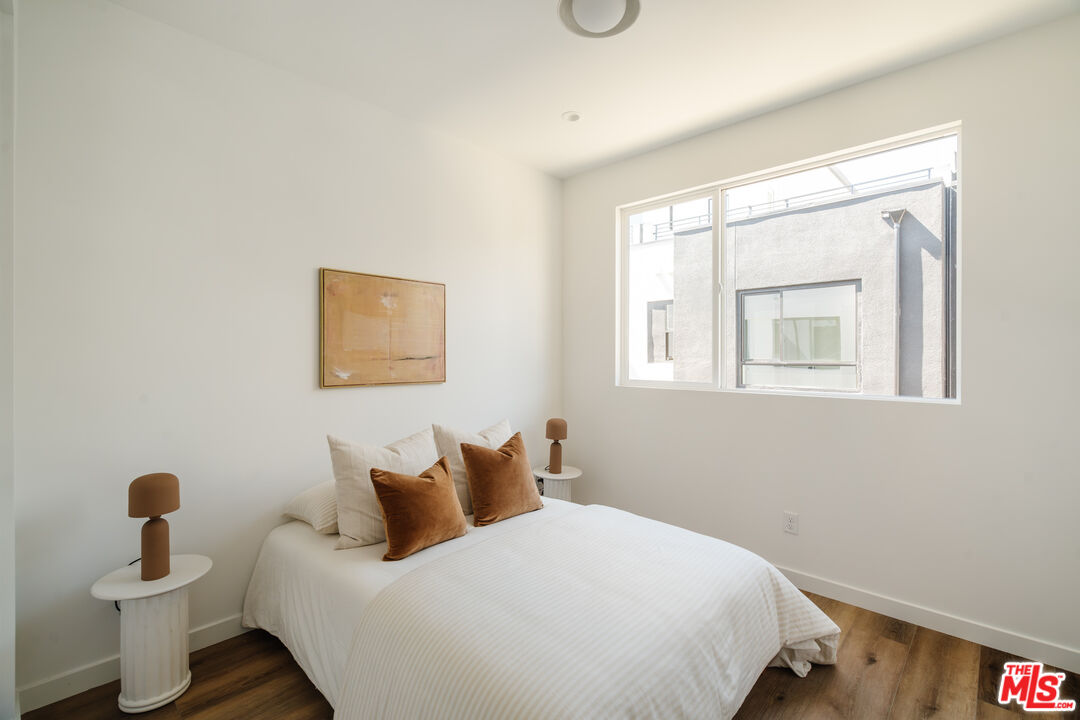 3872 North Riley Lane Los Angeles, CA 90065 - Photo 12 of 30 a bedroom with a bed and a window