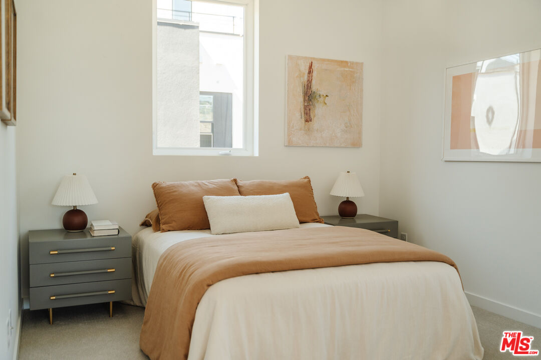 3872 North Riley Lane Los Angeles, CA 90065 - Photo 13 of 30 a bedroom with a bed and a window