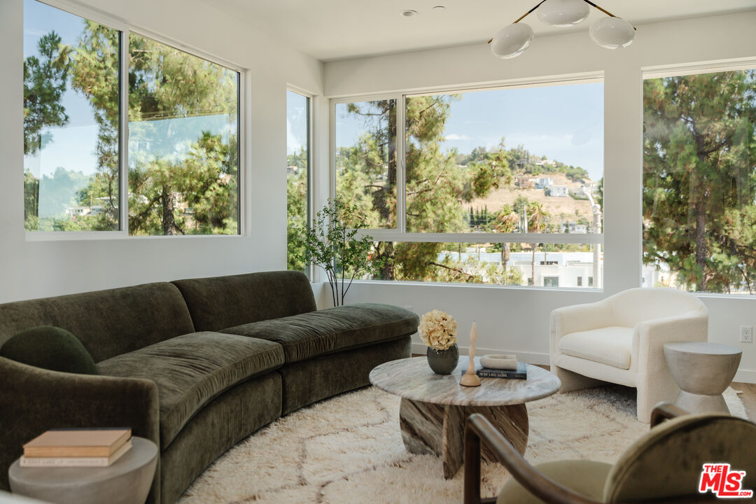 3872 North Riley Lane Los Angeles, CA 90065 - Photo 16 of 30 a living room with furniture and a large window