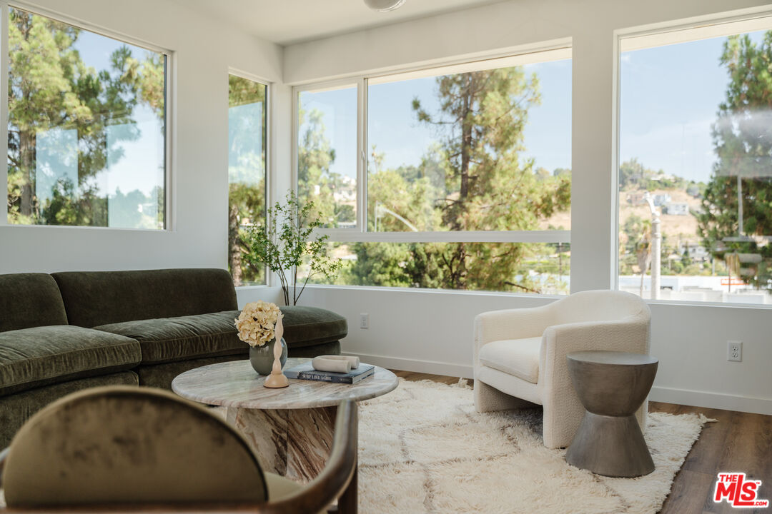3872 North Riley Lane Los Angeles, CA 90065 - Photo 2 of 30 a living room with furniture and a large window