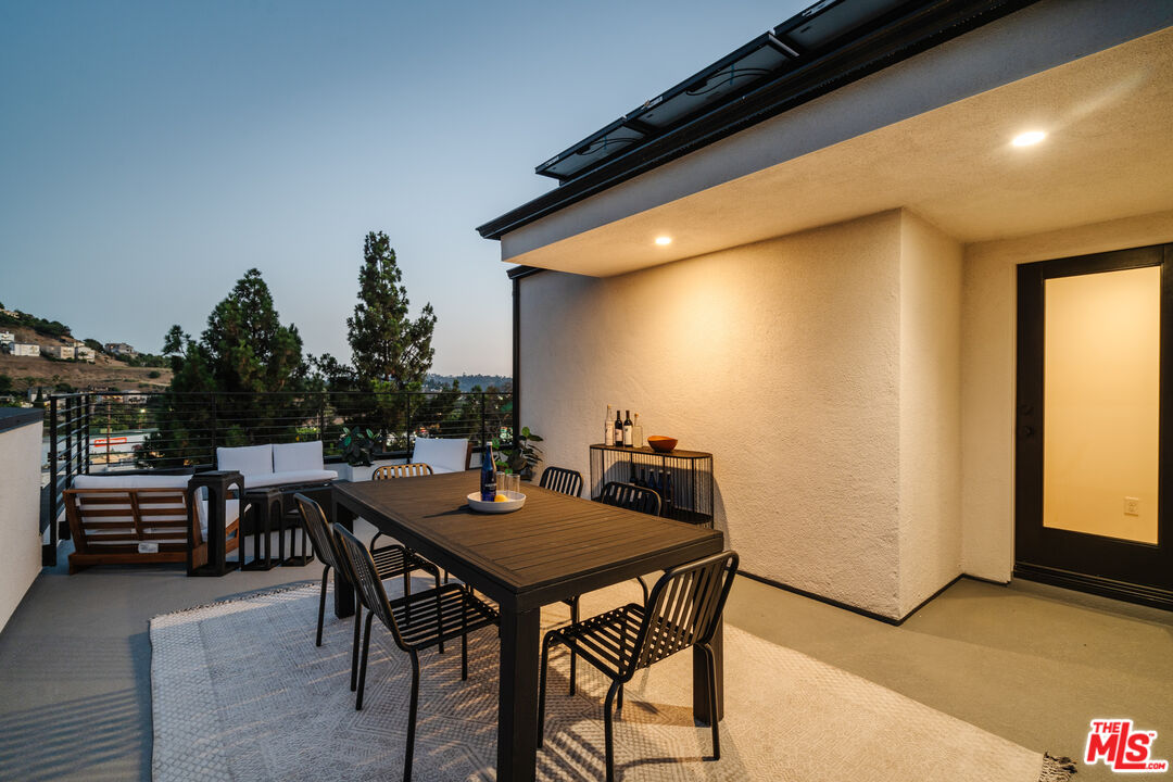 3872 North Riley Lane Los Angeles, CA 90065 - Photo 25 of 30 a view of a dining table and chairs in the patio