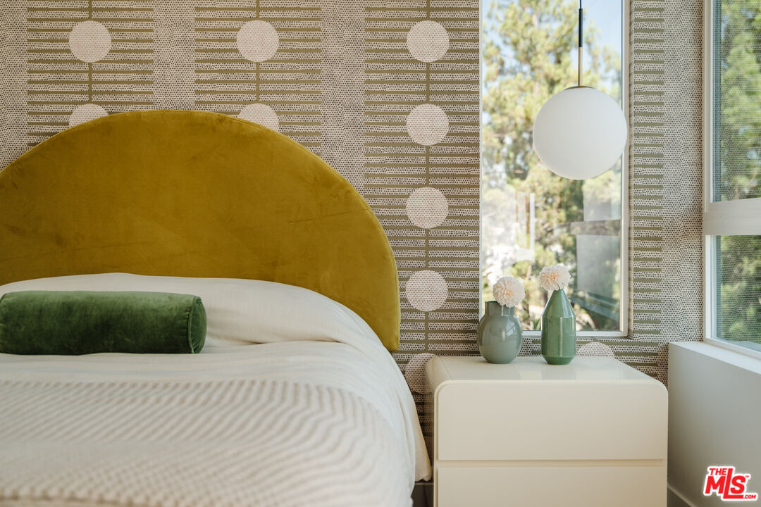 3872 North Riley Lane Los Angeles, CA 90065 - Photo 10 of 30 a bedroom with a bed and a window