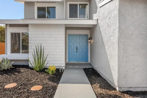 an aerial view of residential house with outdoor space