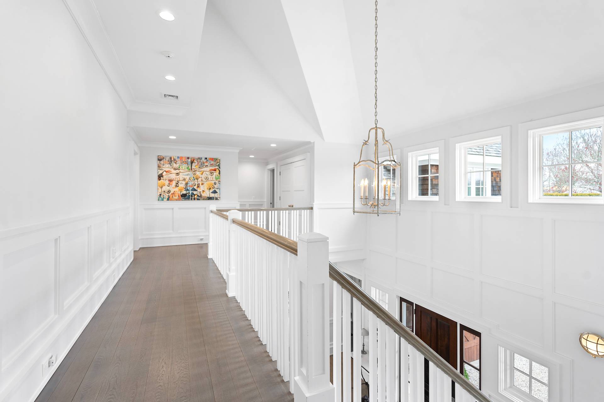 135 Hildreth Lane Bridgehampton, NY 11932 - Photo 14 of 38 a view of a hallway with wooden floor and staircase
