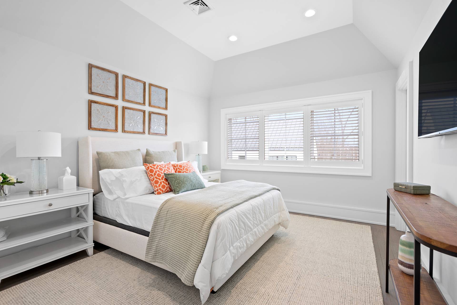 135 Hildreth Lane Bridgehampton, NY 11932 - Photo 23 of 38 a bedroom with a bed and a flat screen tv