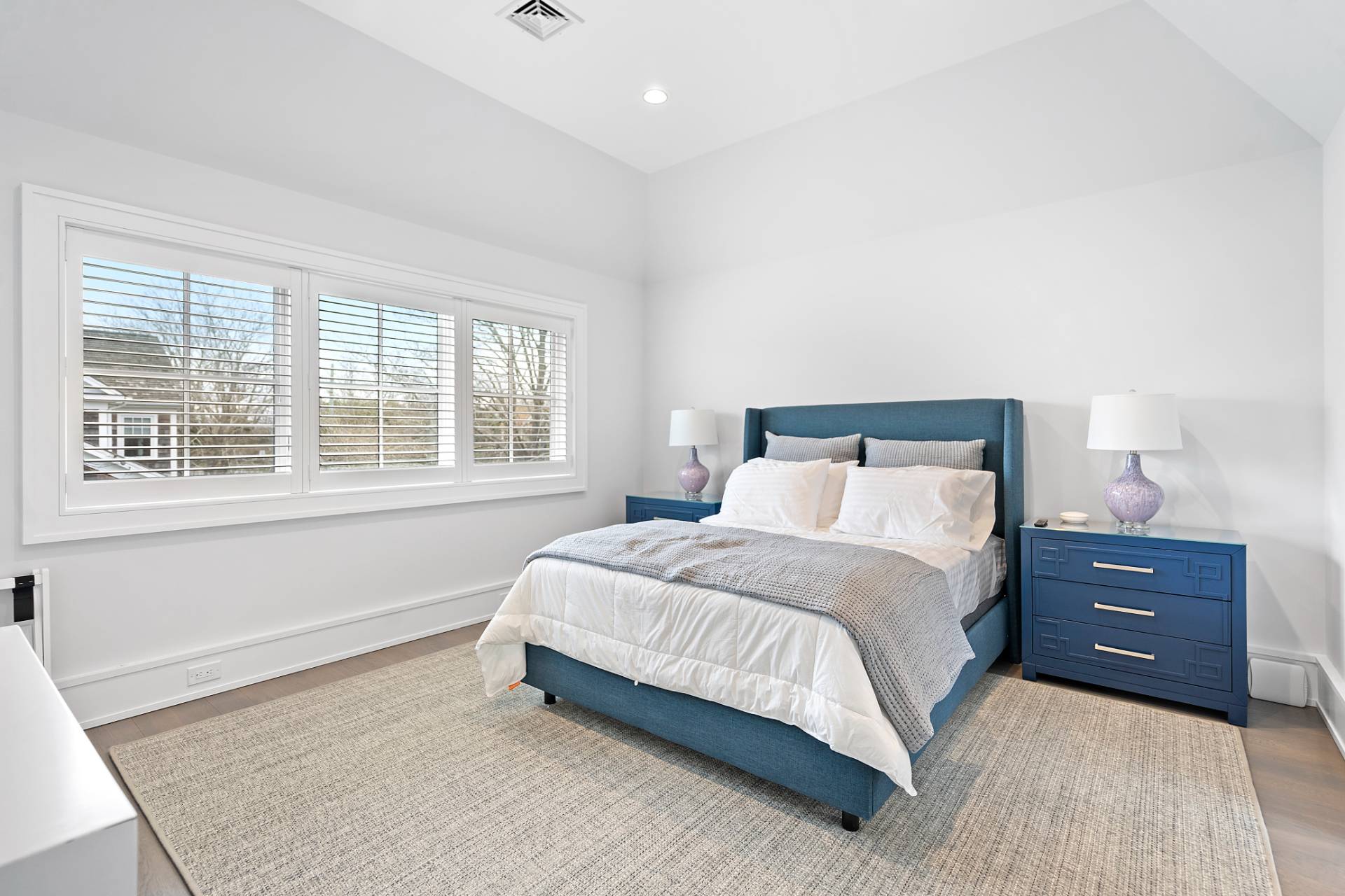 135 Hildreth Lane Bridgehampton, NY 11932 - Photo 27 of 38 a bedroom with a bed and window