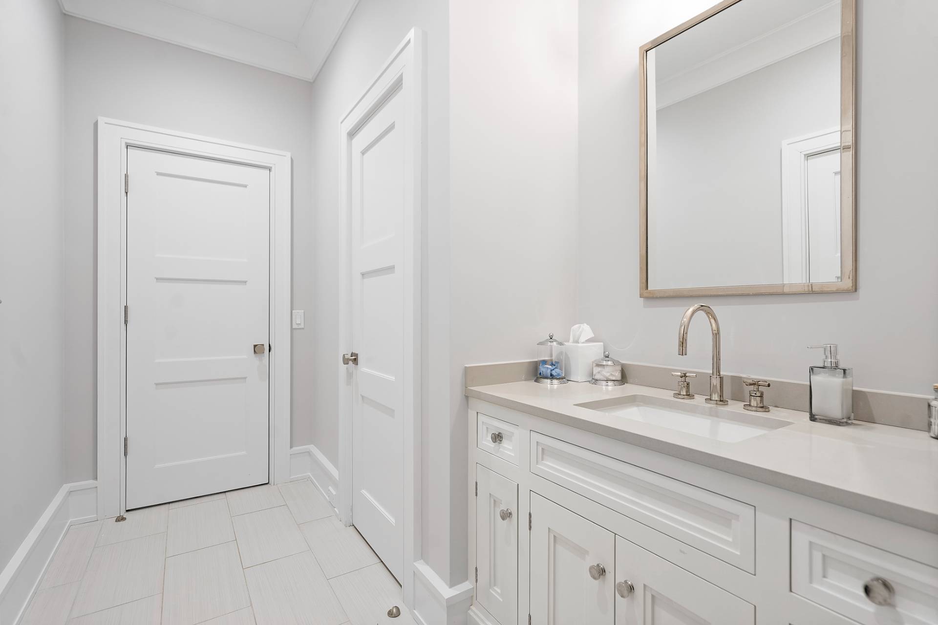 135 Hildreth Lane Bridgehampton, NY 11932 - Photo 34 of 38 a bathroom with a sink and a mirror
