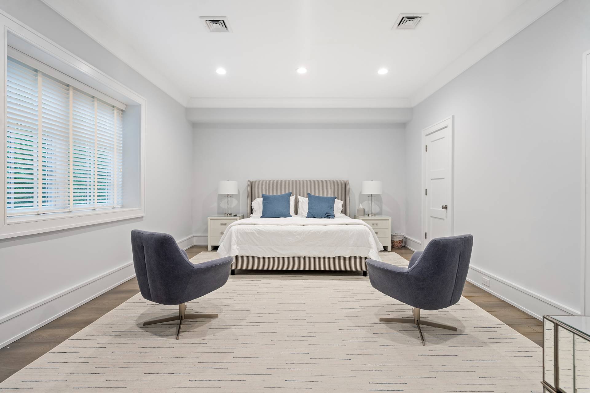 135 Hildreth Lane Bridgehampton, NY 11932 - Photo 35 of 38 a bedroom with furniture and a chair