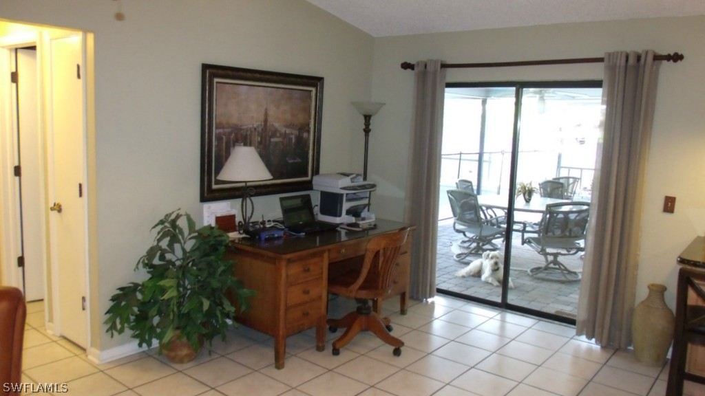 17549 Lebanon Road Fort Myers, FL 33967 - Photo 9 of 20 a view of a workspace with furniture and a window