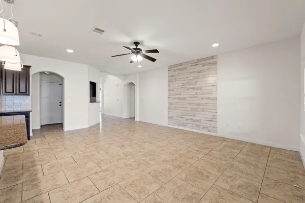 a view of an empty room with a bathroom