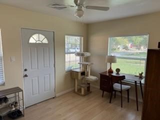 932 Walling Street Houston, TX 77009 - Photo 4 of 23 a workspace with furniture and window