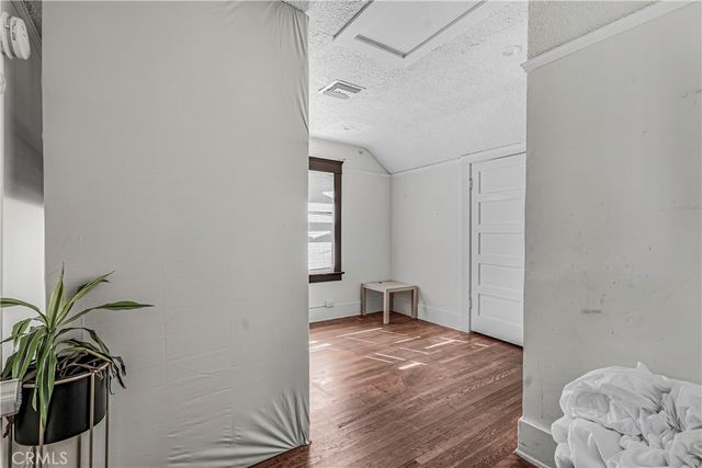 a view of livingroom with furniture and wooden floor