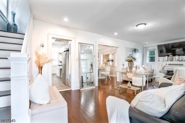 a living room with furniture and a table