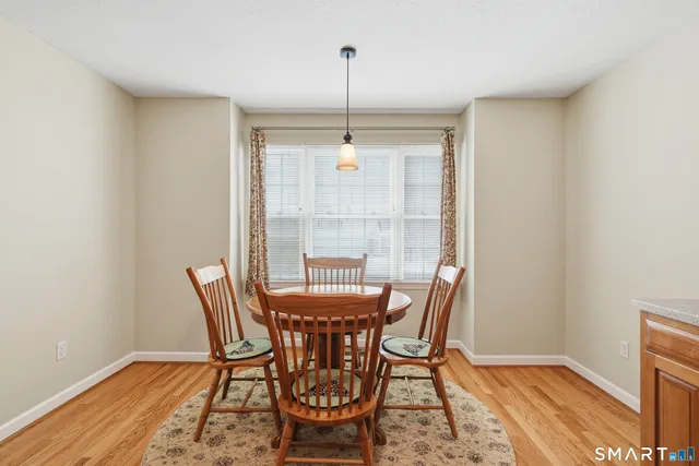 a kitchen with a sink and a refrigerator