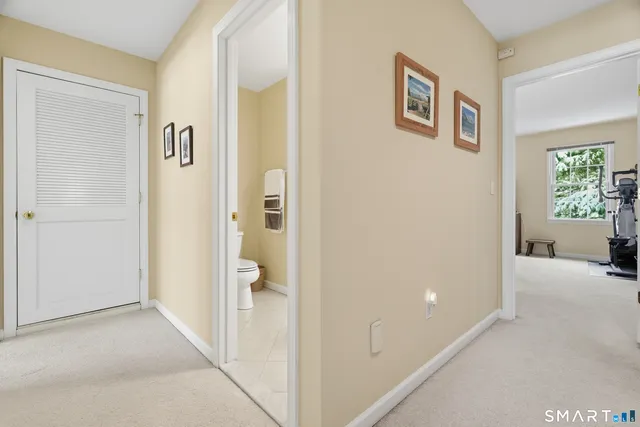 a view of a livingroom from a hallway