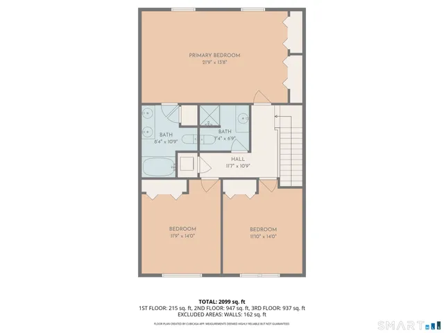 a front view of a house with a yard and parking