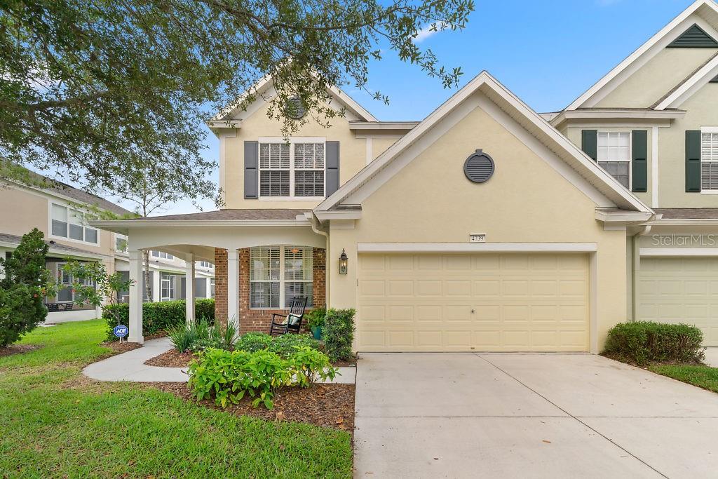 4739 Pond Ridge Drive Riverview, FL 33578 - Photo 1 of 1 a front view of a house with a yard and trees