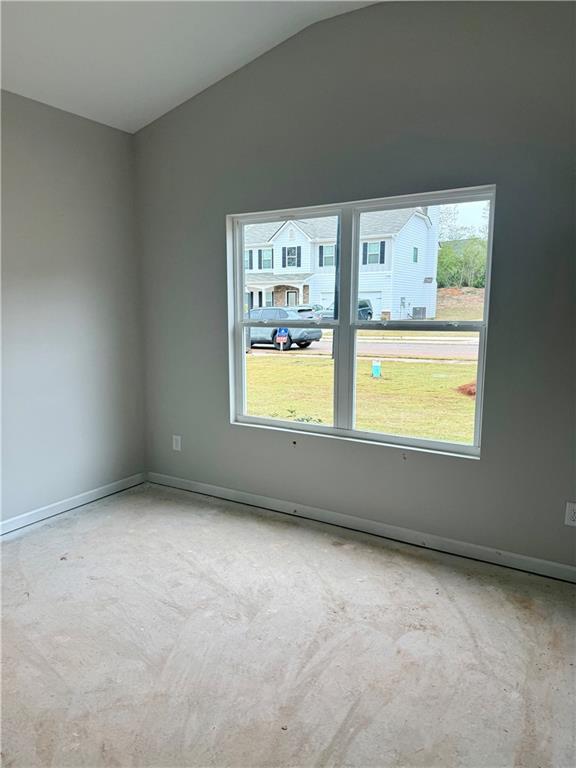 503 Charleston Place Villa Rica, GA 30180 - Photo 4 of 14 an empty room with windows