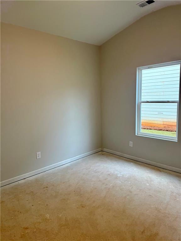 503 Charleston Place Villa Rica, GA 30180 - Photo 6 of 14 an empty room with a window