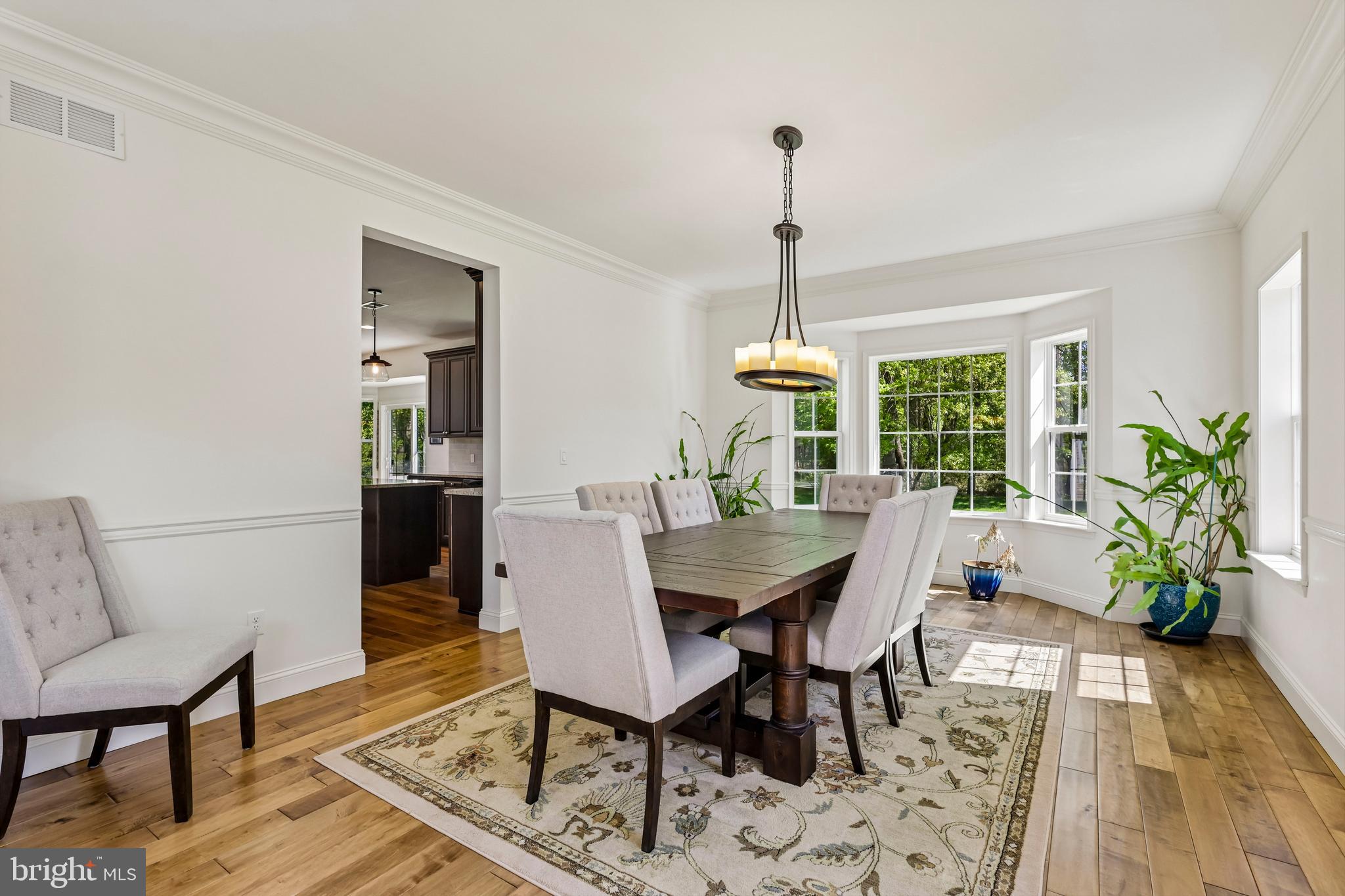 41 Emerald Road Robbinsville, NJ 08691 - Photo 11 of 69 a view of a dining room with furniture window and wooden floor